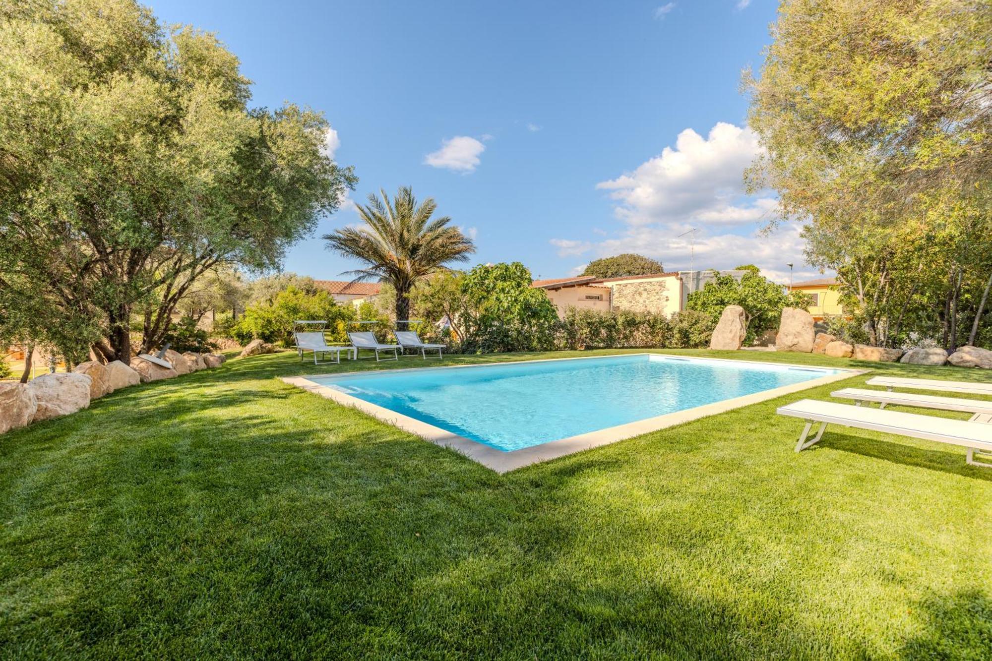 Stazzo San Teodoro Il Ginepro Piscina Condivisa Apartment Exterior photo