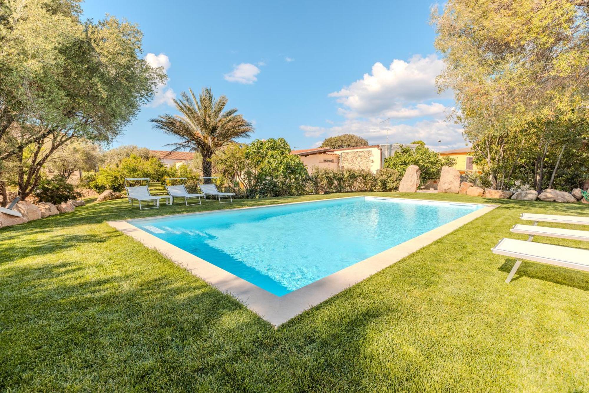 Stazzo San Teodoro Il Ginepro Piscina Condivisa Apartment Exterior photo
