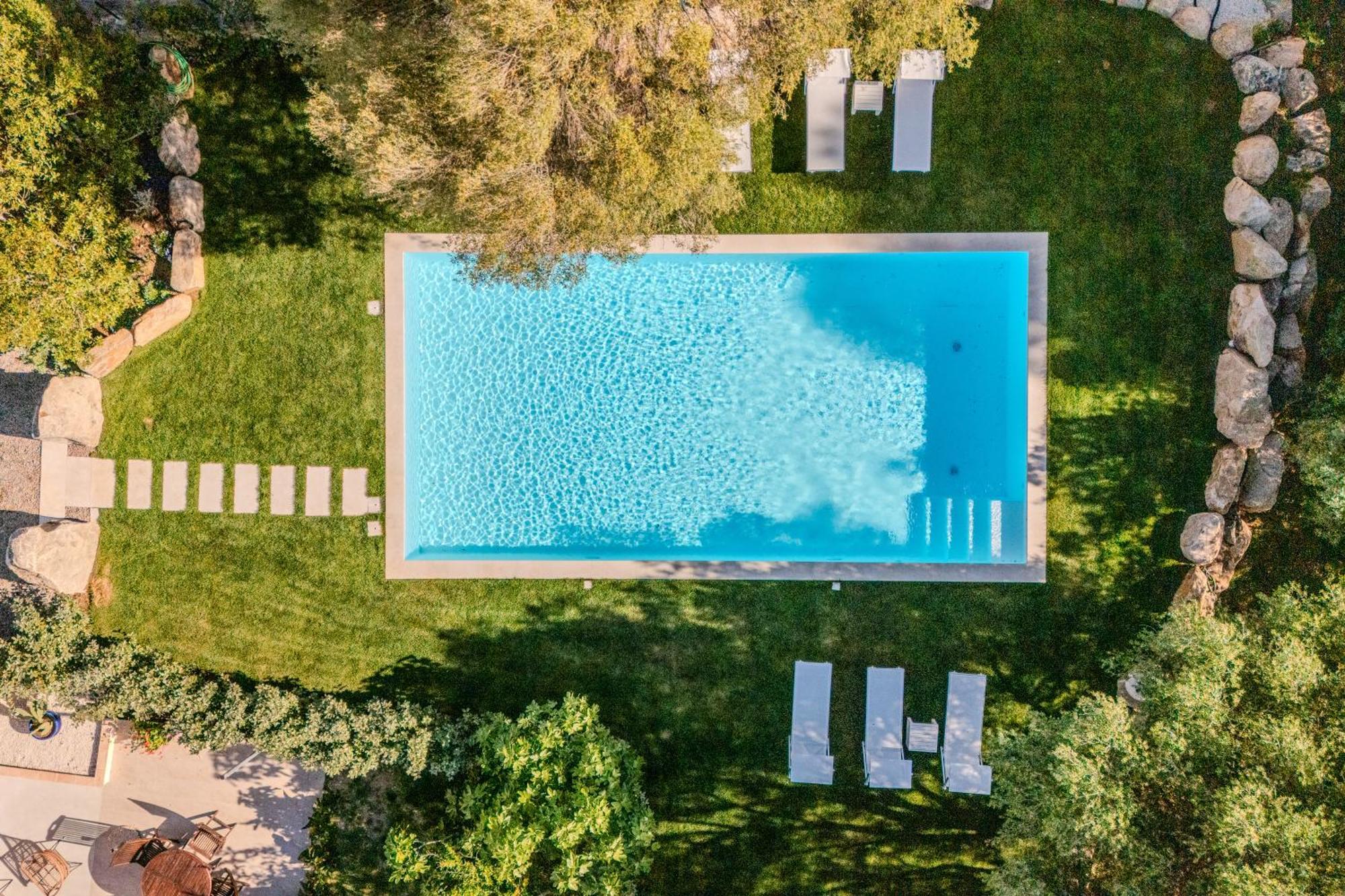 Stazzo San Teodoro Il Ginepro Piscina Condivisa Apartment Exterior photo