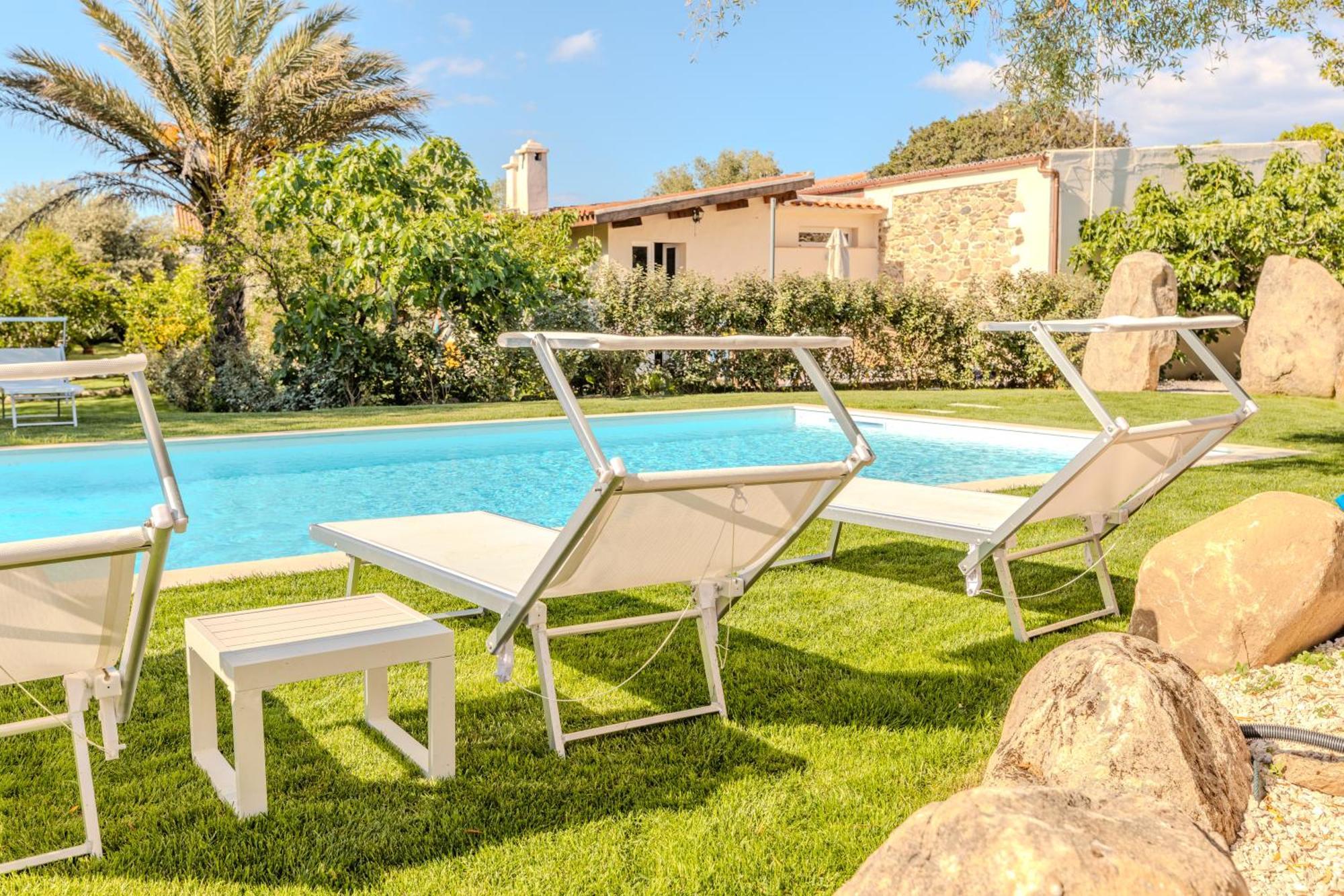 Stazzo San Teodoro Il Ginepro Piscina Condivisa Apartment Exterior photo